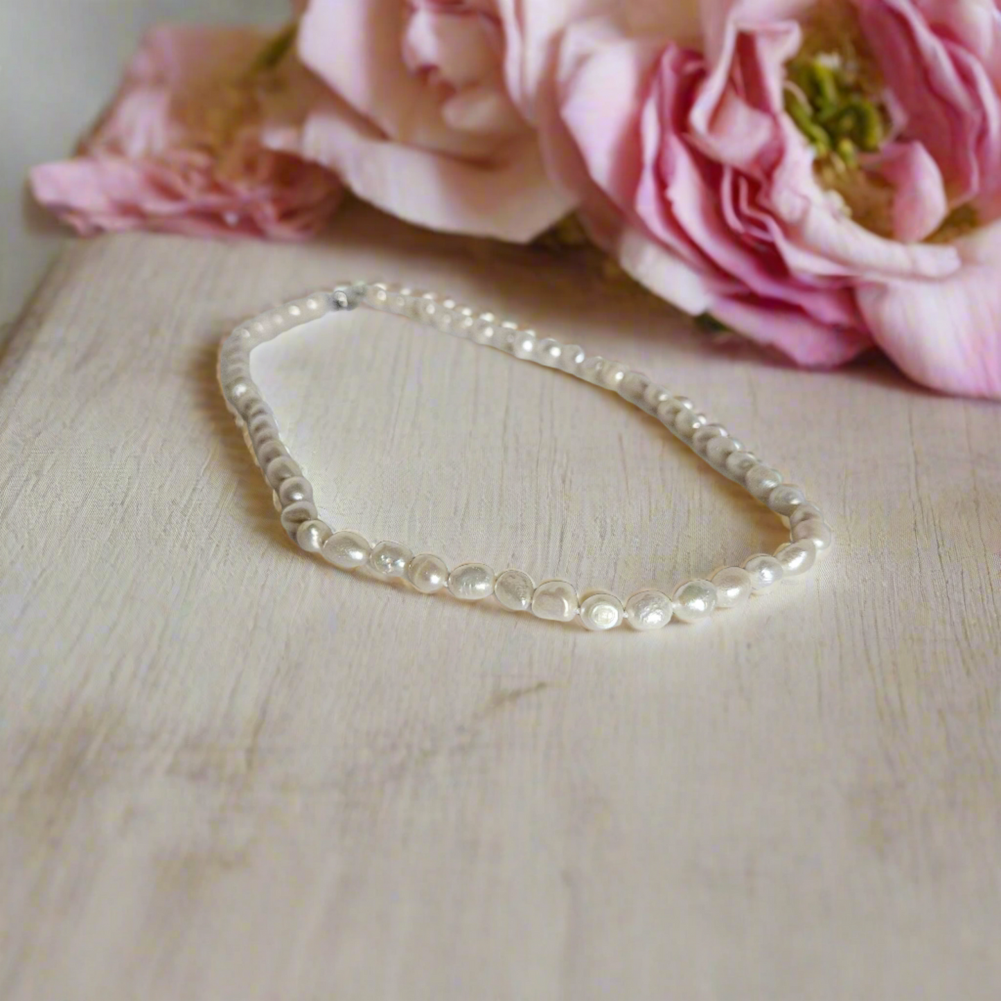 Timeless Elegance: Baroque Pearl Strand Necklace with Sterling Silver Clasp