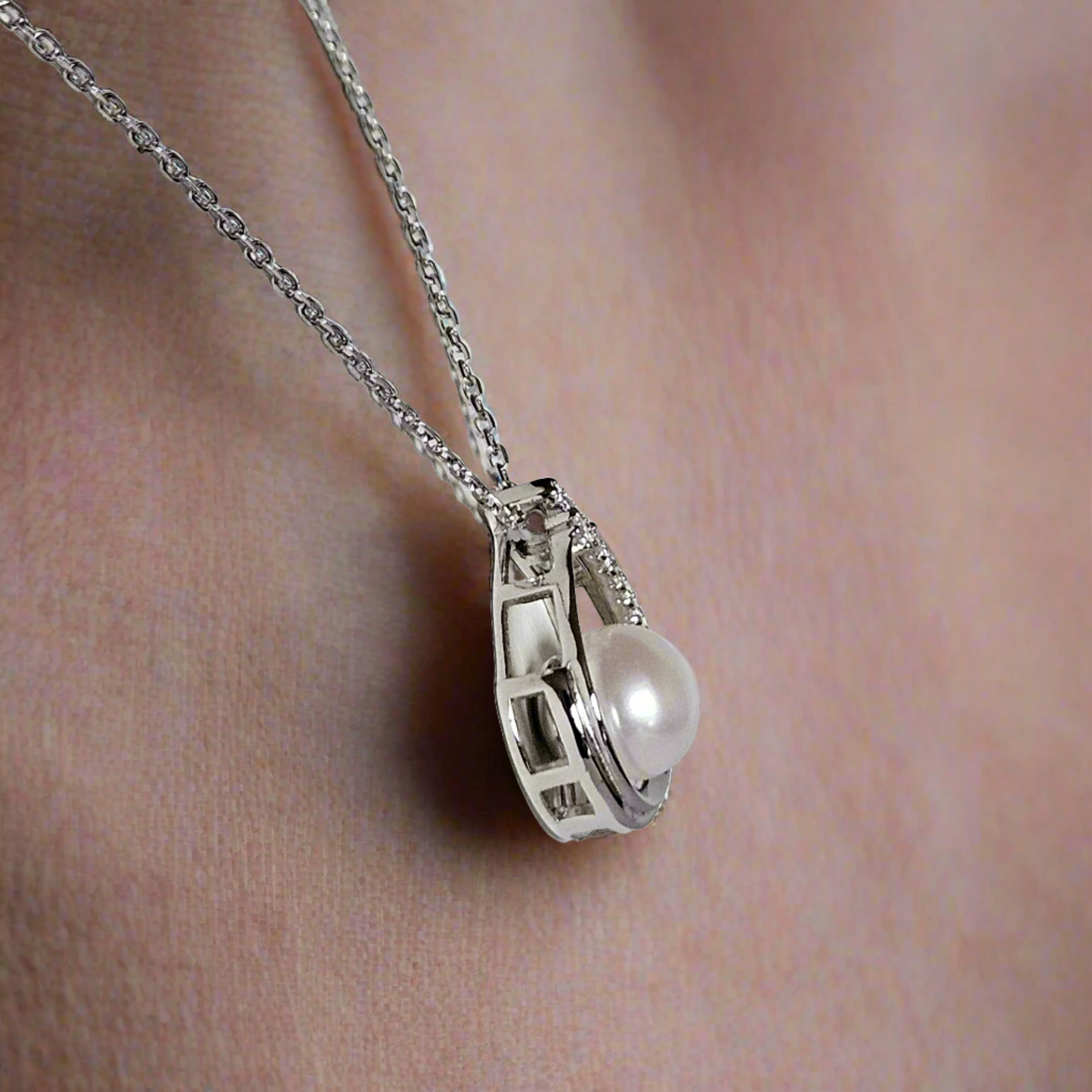 Enchanting Elegance: Sterling Silver Pearl Pendant Accented with Moissanite