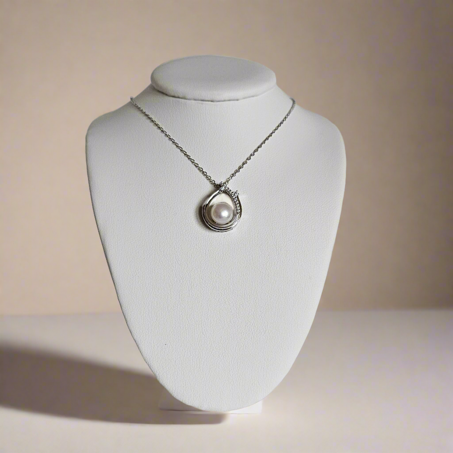 Enchanting Elegance: Sterling Silver Pearl Pendant Accented with Moissanite