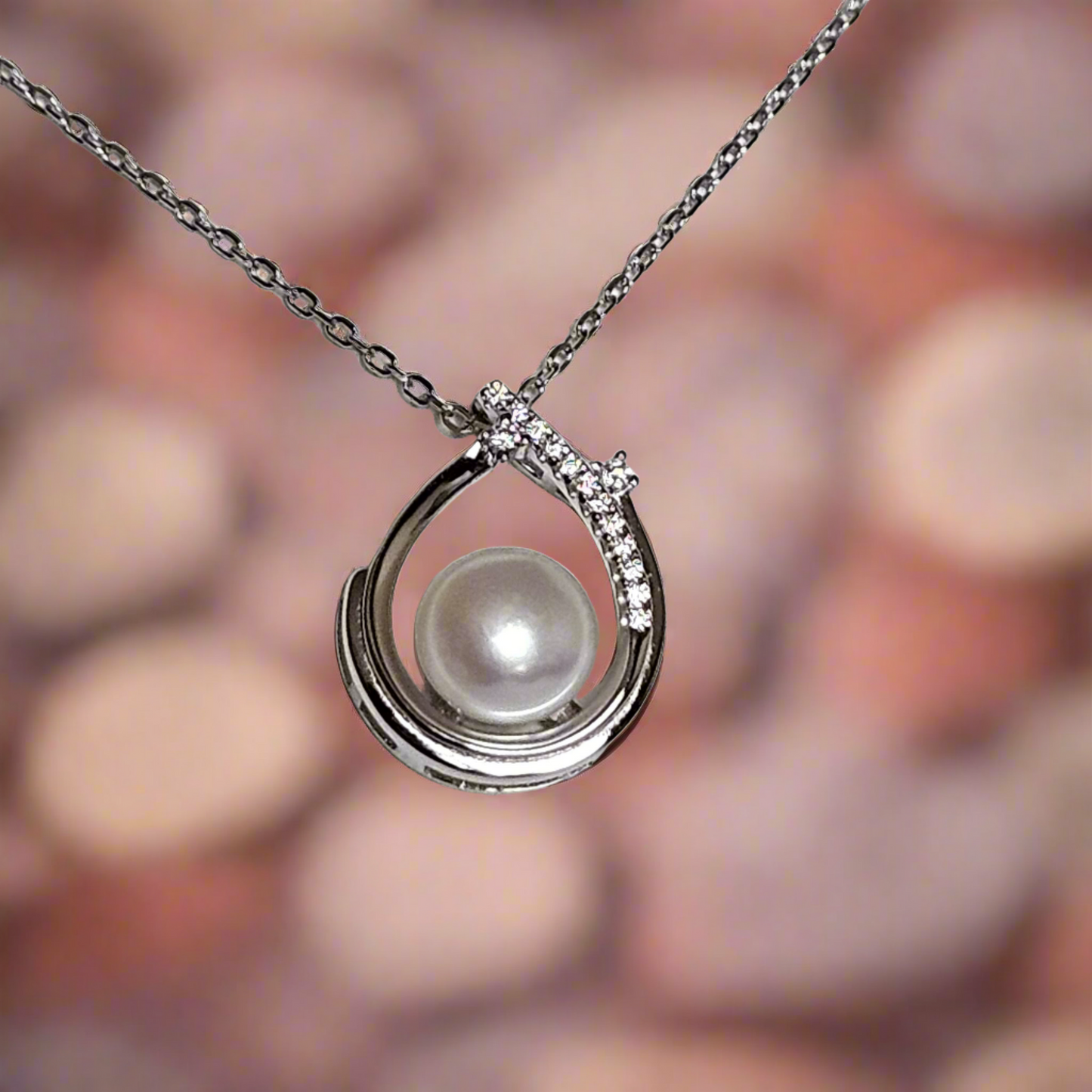 Enchanting Elegance: Sterling Silver Pearl Pendant Accented with Moissanite