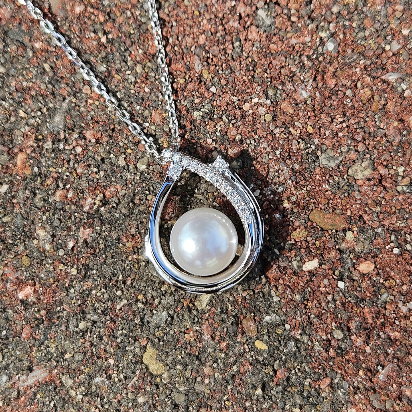 Enchanting Elegance: Sterling Silver Pearl Pendant Accented with Moissanite