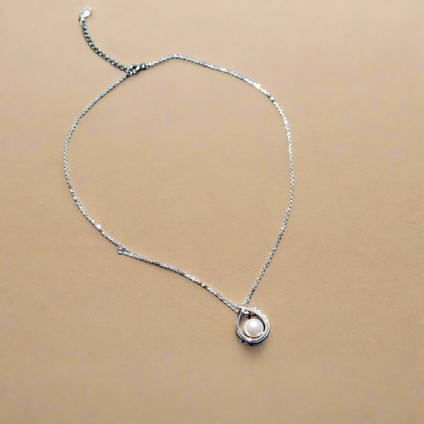 Enchanting Elegance: Sterling Silver Pearl Pendant Accented with Moissanite