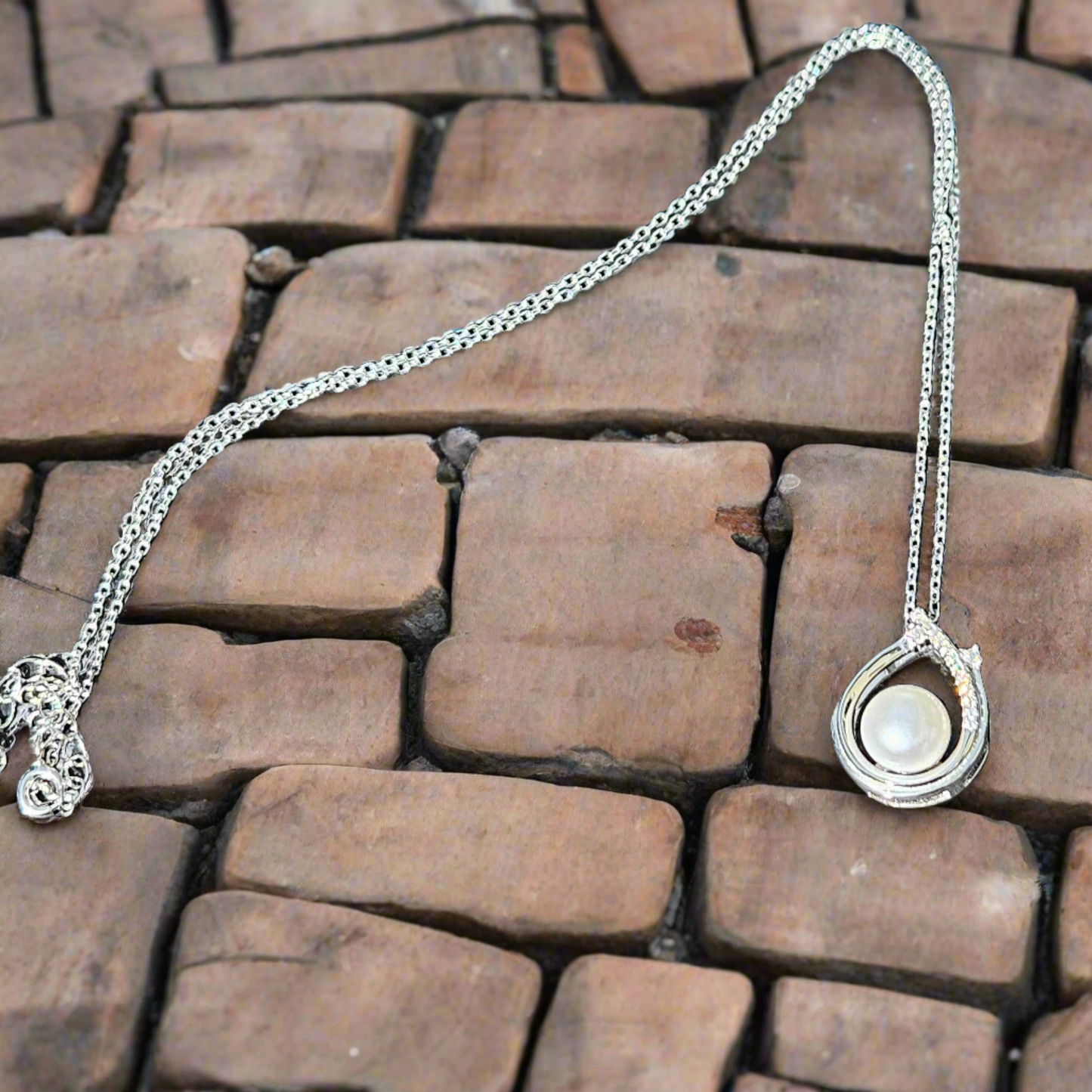 Enchanting Elegance: Sterling Silver Pearl Pendant Accented with Moissanite