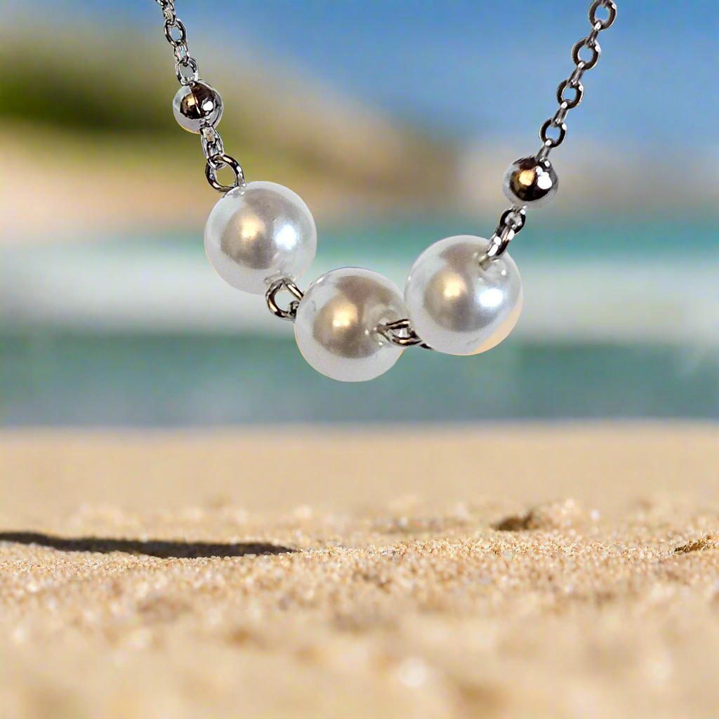 Everlasting Bonds: Sterling Silver Charm Bracelet with Pearls of Friendship