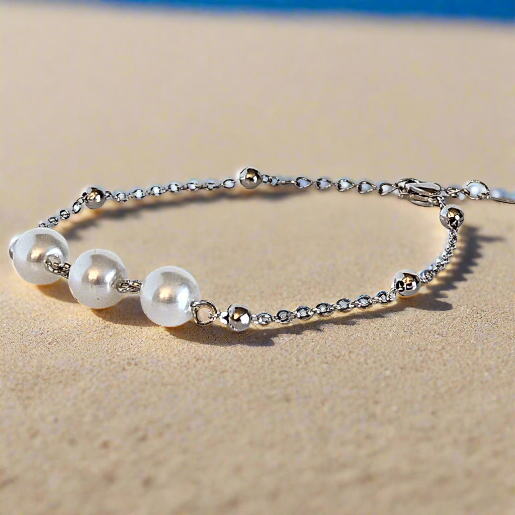 Everlasting Bonds: Sterling Silver Charm Bracelet with Pearls of Friendship