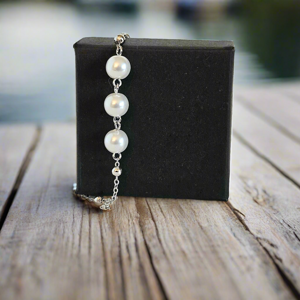 Everlasting Bonds: Sterling Silver Charm Bracelet with Pearls of Friendship